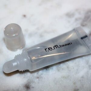 R.E.M BEAUTY |  Ariana Grande Utmost Importance Plumping Lip Gloss NIB